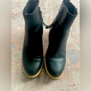 Toms black booties with zippers.